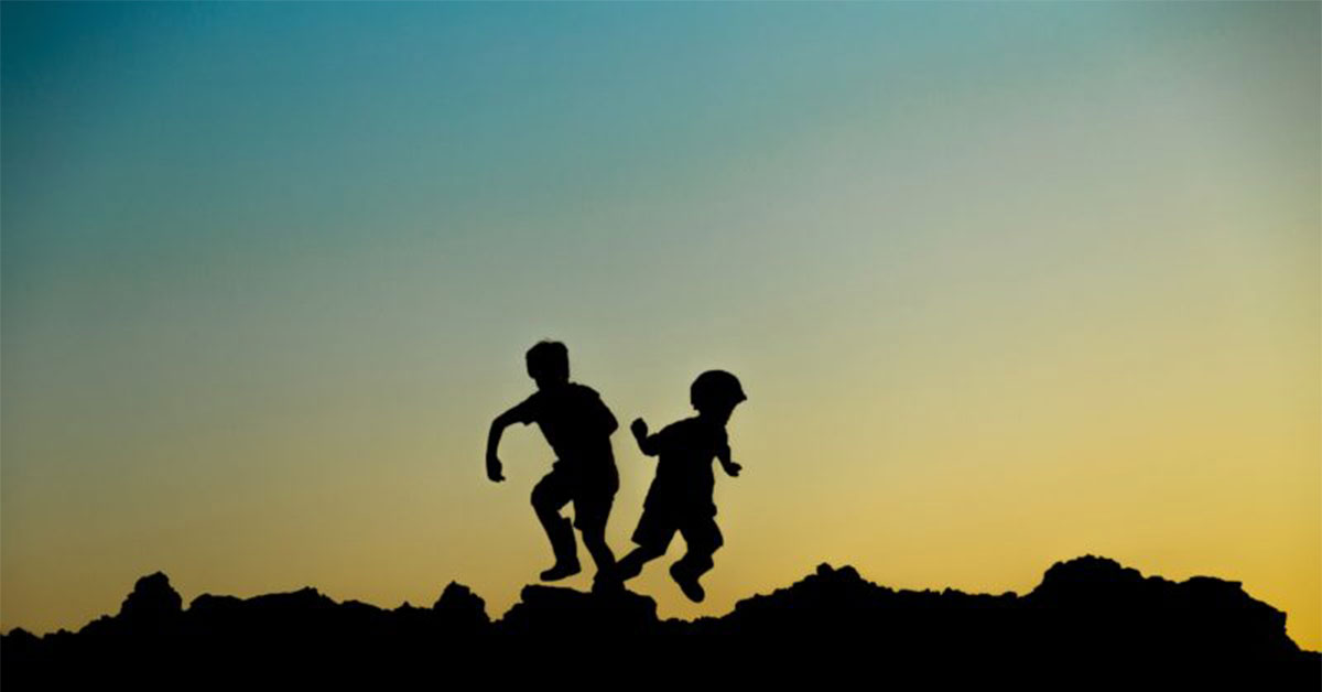 Cartoon of two kids holding hands with a tooth