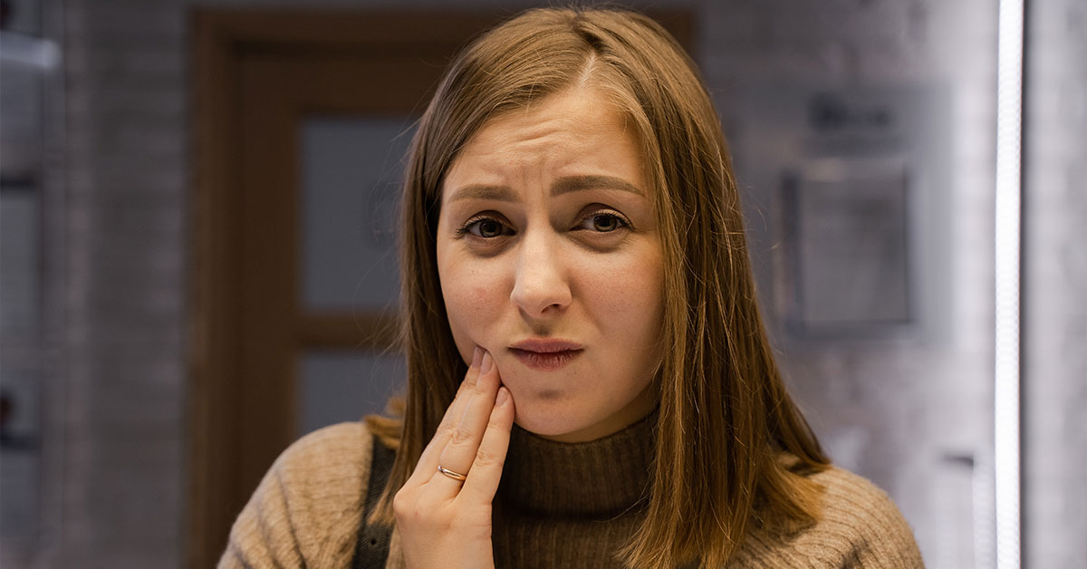 Cartoon of teeth complaining about sour, cold and heat