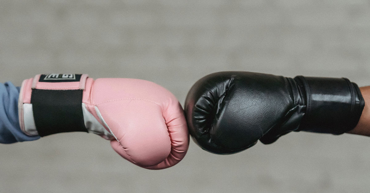 Boxers touching gloves - sports safe mouthguards